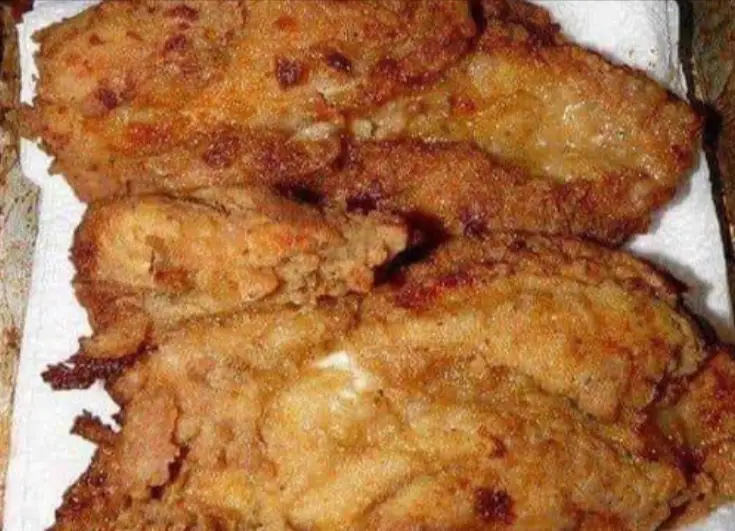 3 spray(s) cooking spray 1 pound(s) uncooked boneless skinless chicken breast(s), four 4-oz pieces 1/2 tsp table salt, divided, or to taste 1/4 tsp cayenne pepper, divided, or to taste 1/3 cup(s) all-purpose flour 3 oz low-fat buttermilk 1/2 cup(s) cornflake crumbs